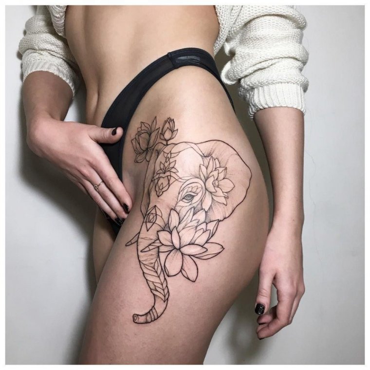 Эскизы татуировок на бедре для девушек (49 фото)31