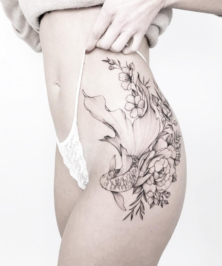 Эскизы татуировок на бедре для девушек (49 фото)32