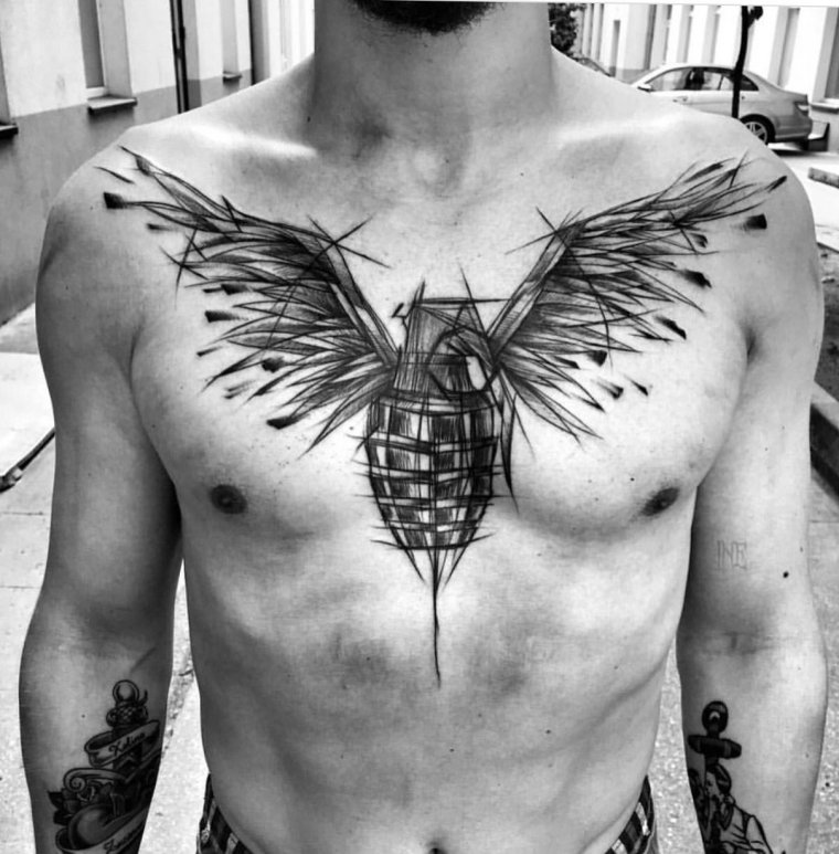 Татуировка крылья на груди (50 фото)11