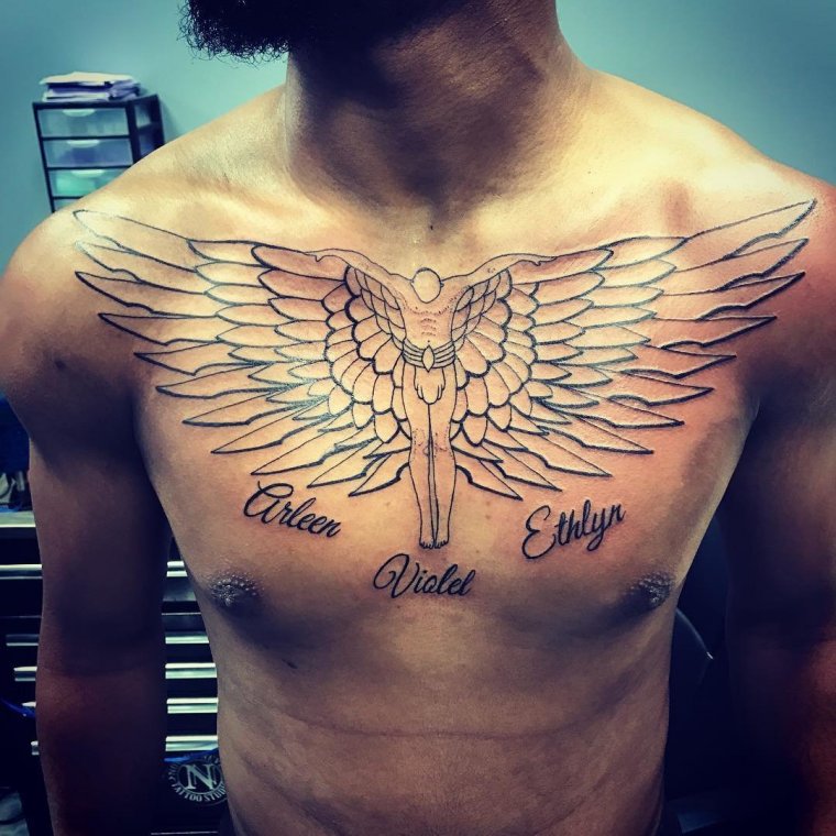 Татуировка крылья на груди (50 фото)47