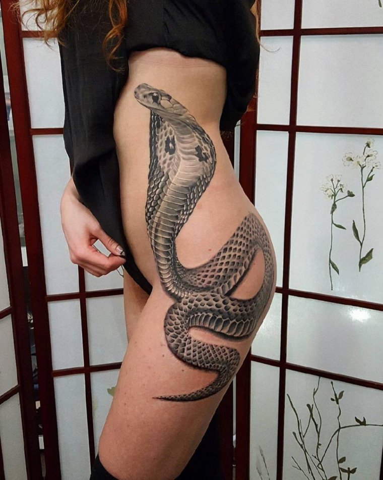 Татуировка змея на ноге (50 фото)32