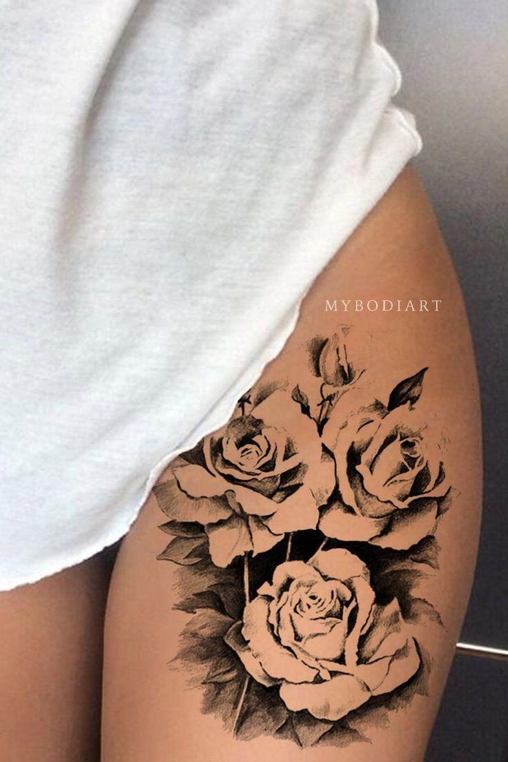 Татуировки для девушек на бедре розы с шипами