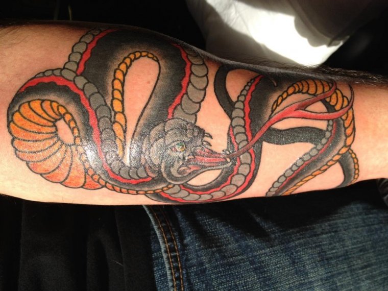 Татуировка змея значение